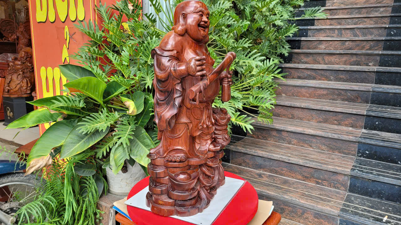 tượng di lạc cầm cân gỗ hương ta đẹp